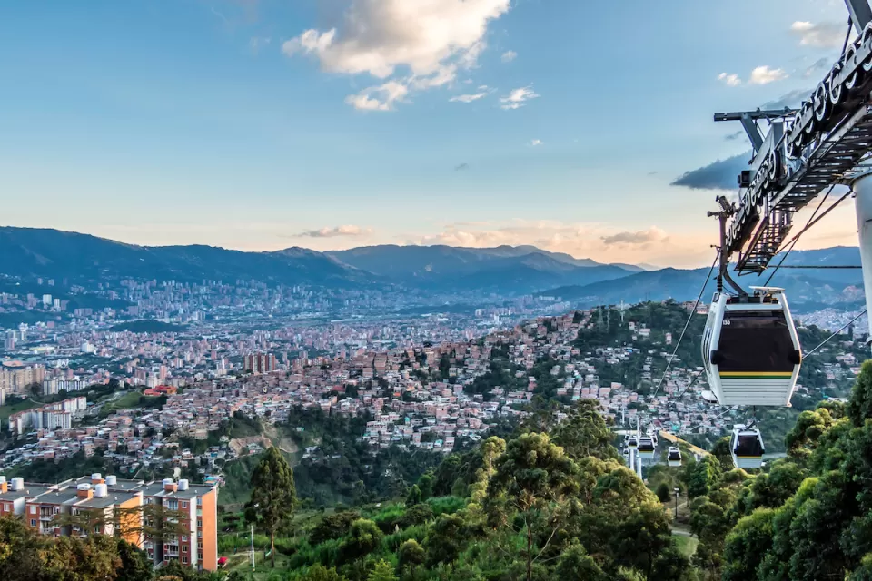 Aerial gondola car in the air overlooking the city of Medellin, Colombia.